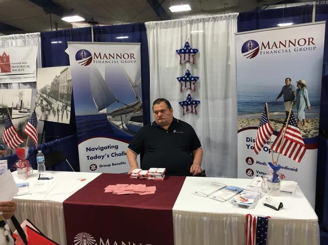 Mike Costa representing Mannor Group at the Traverse City Senior Expo 